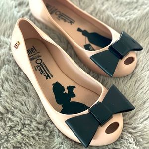 Mel by Melissa “Alice In Wonderland” edition. Light pastel pink, size 12.